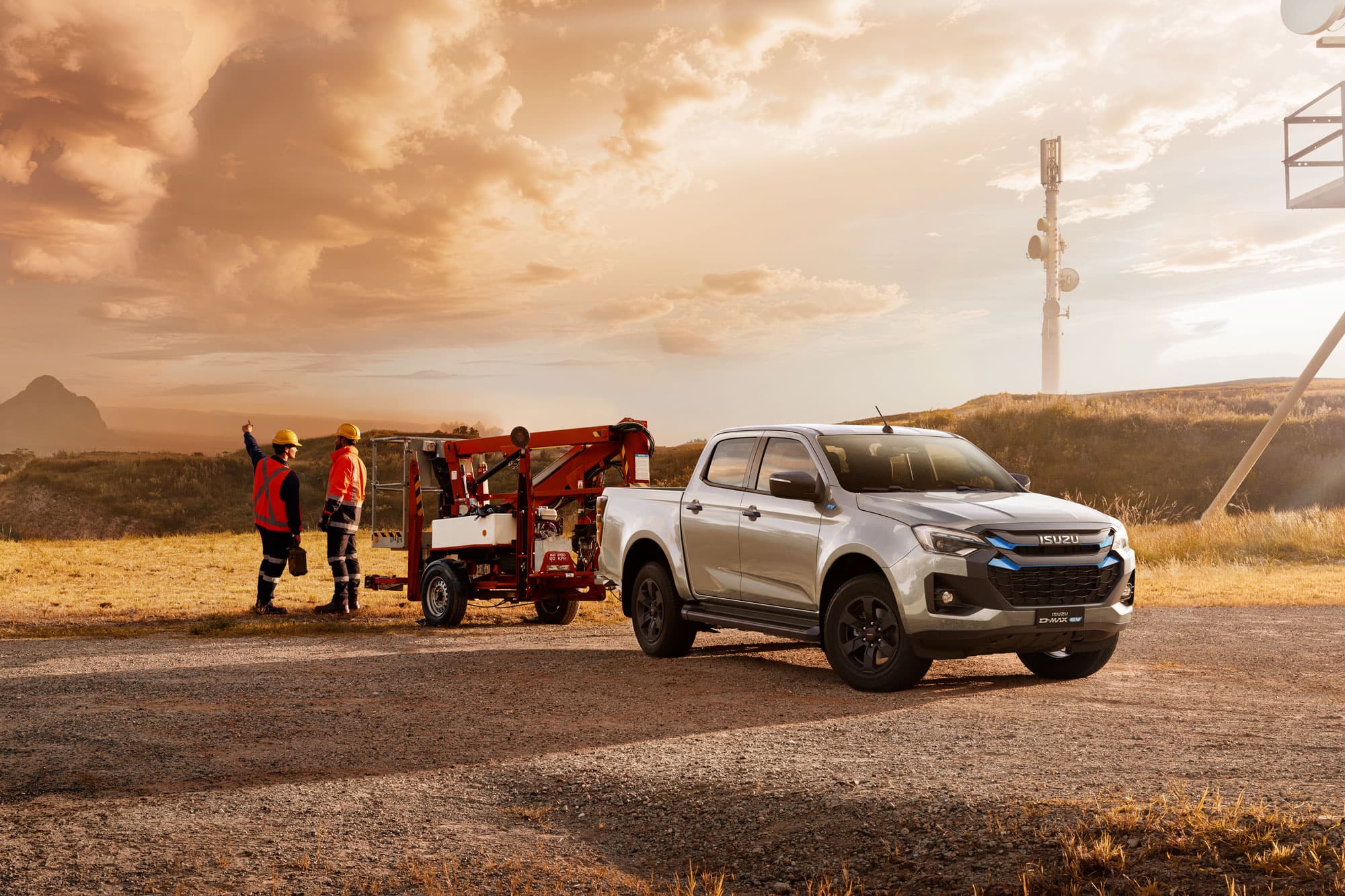 White Isuzu D-MAX EV Double Cab with Telecom workers