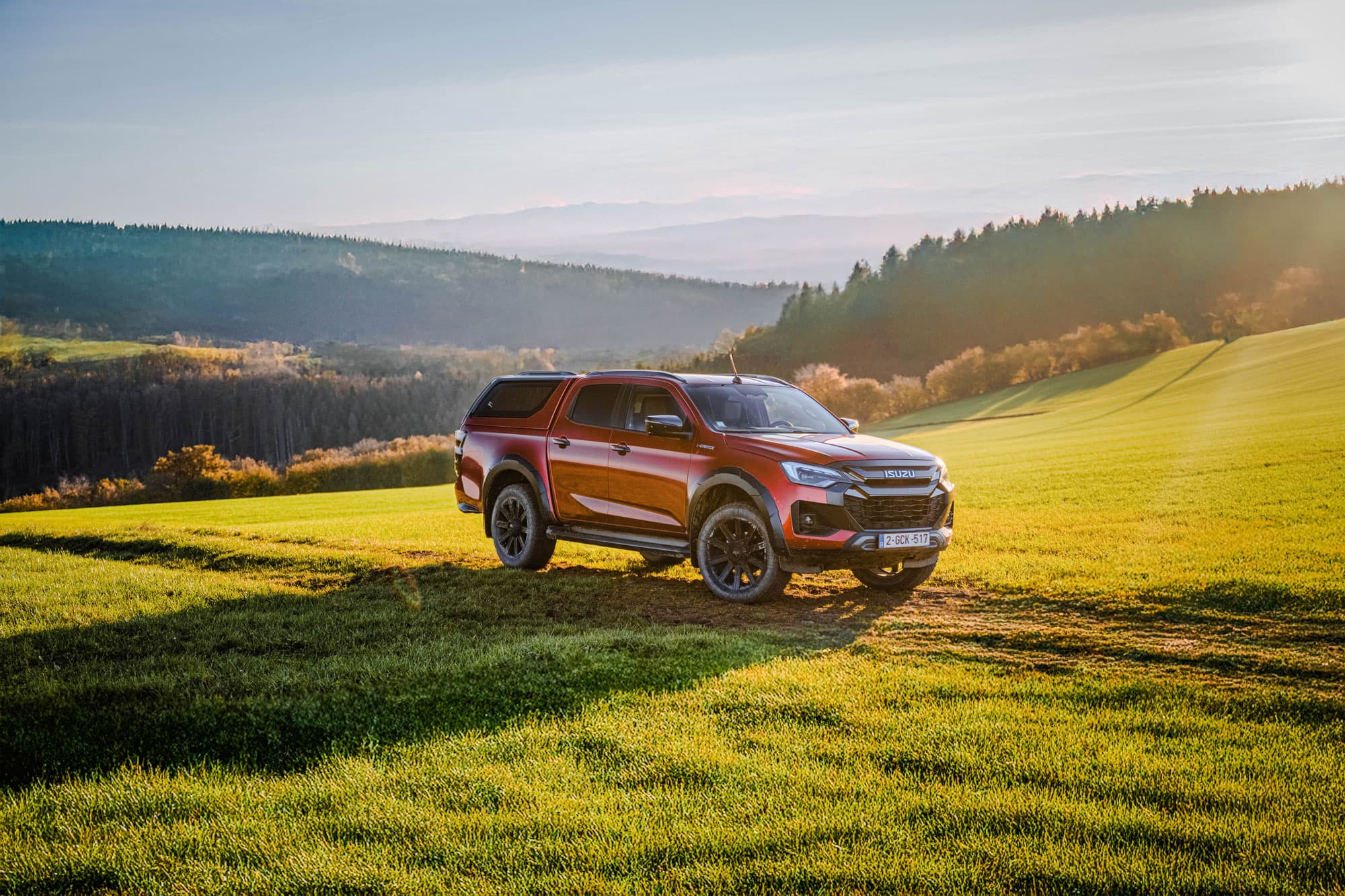 Isuzu D-Max Double Cab hardtop in a field
